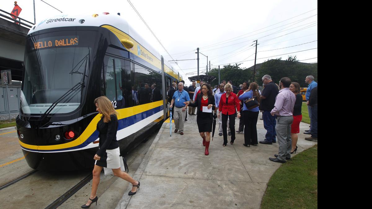 
Passengers get off the new Dallas Area Rapid Transit streetcar last month. Dallas is the latest city to get on the streetcar bandwagon.
