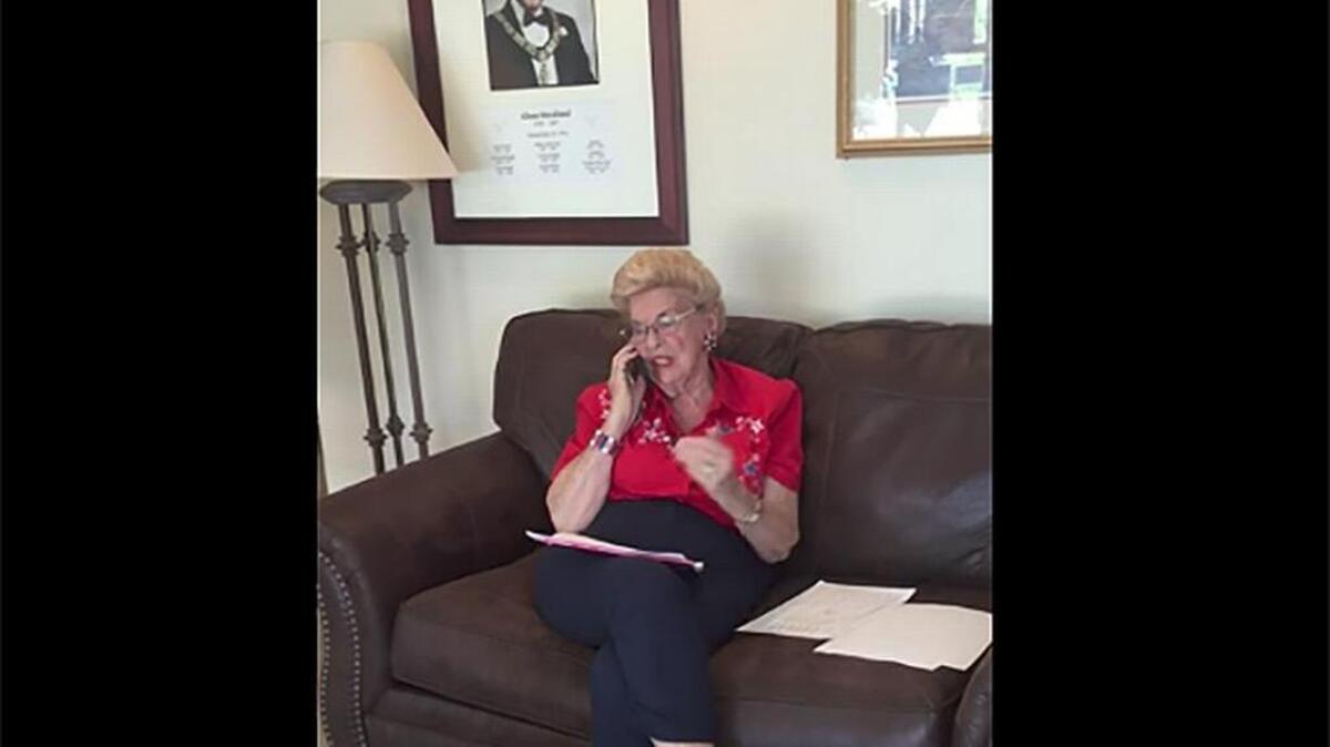 A video screenshot shows Republican activist Edie Knight of Atascadero talking on the phone in the lobby of the Elks Lodge on Election Day, June 7, 2016. She faces two charges of electioneering at a polling place.