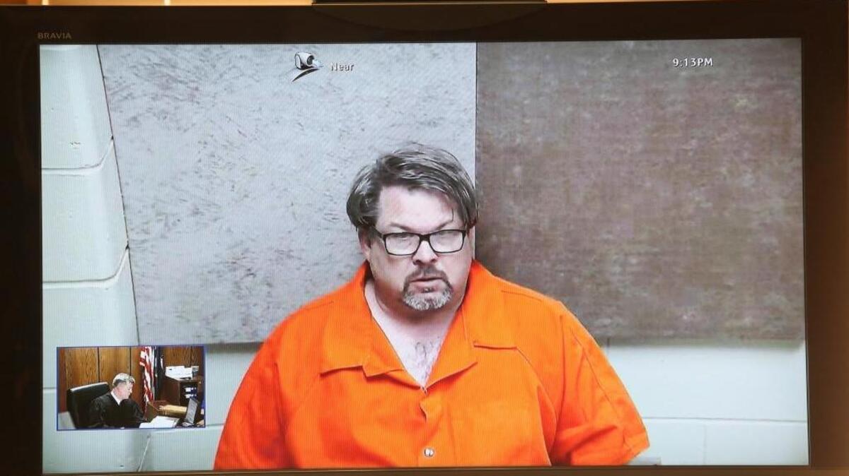 Jason Dalton of Kalamazoo Township, Mich., is arraigned via video Monday. Dalton is charged with multiple counts of murder in a series of random shootings in western Michigan.