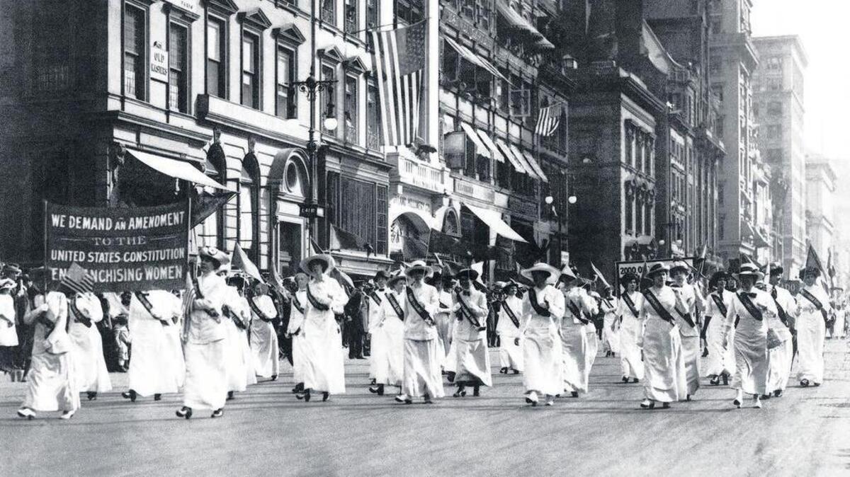 
Women parade last century for the right to vote. 
