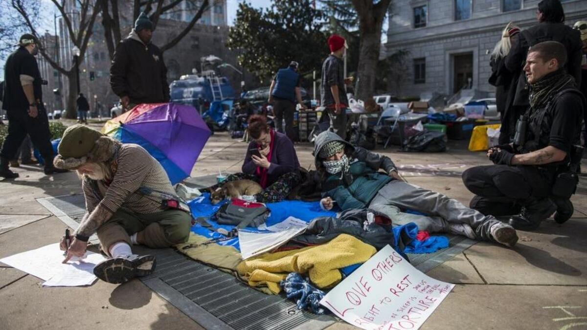 Homeless rights activists occupy the plaza outside Sacramento City Hall in January.