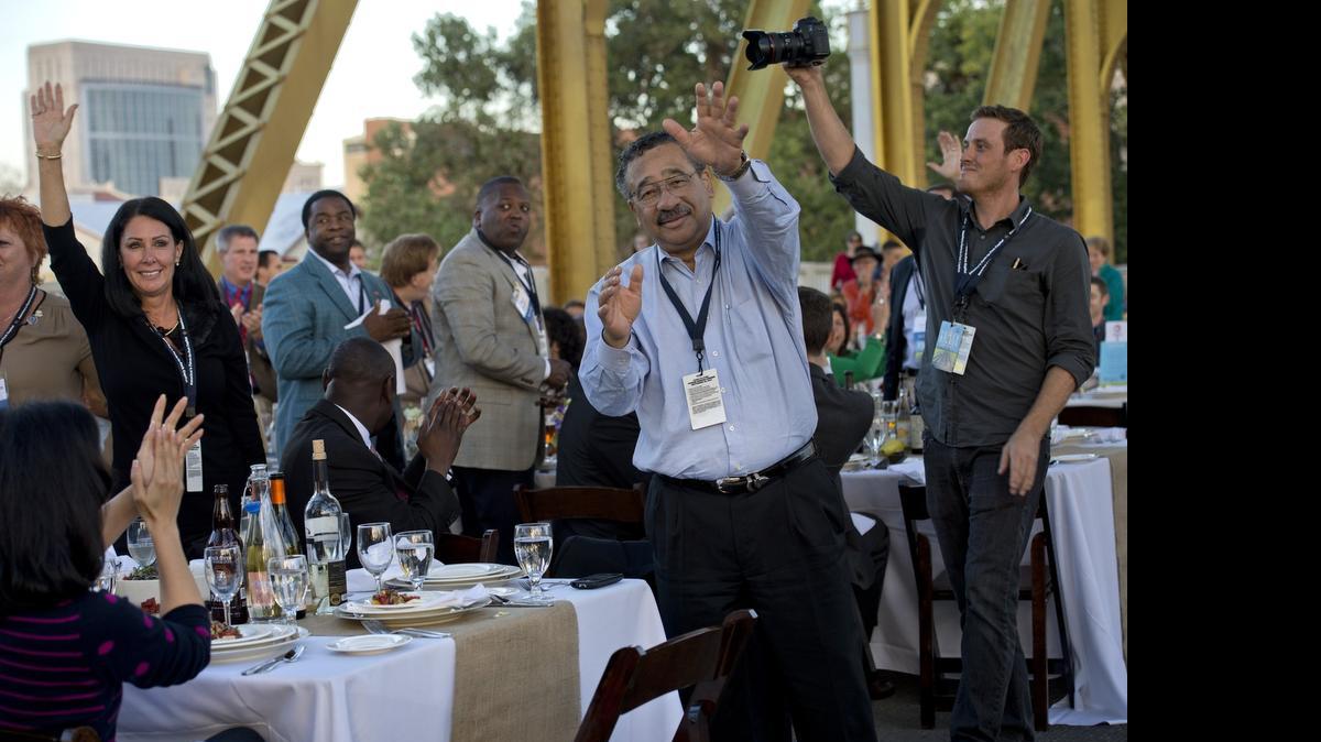 
Then-Mayor John Marks of Tallahassee, Fla., stands among other mayors who attended the second “Farm to Fork” dinner on Tower Bridge last September. 
