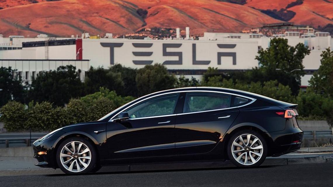 This image provided by Tesla Motors shows the Tesla Model 3 sedan, made in Fremont.