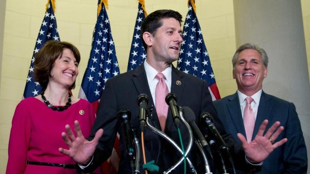 Rep. Paul Ryan, flanked by Rep. Cathy McMorris Rodgers and House Majority Leader Kevin McCarthy, speaks Wednesday after fellow Republicans nominated him to be the next House speaker.