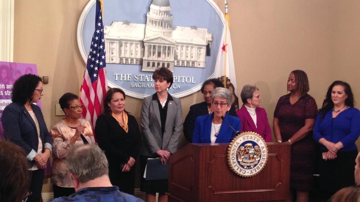 Sen. Hannah-Beth Jackson, at the podium, with Democratic members of the legislative women’s caucus, at a press conference announcing their priorities earlier this year.