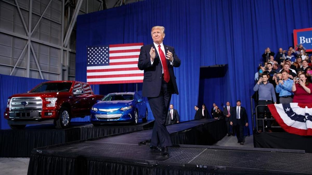 President Donald Trump arrives to speak at the American Center of Mobility in Ypsilanti, Mich., on Wednesday.