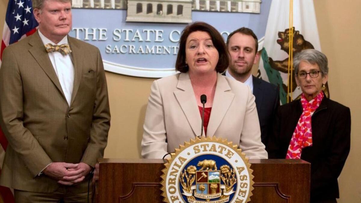 Assembly Speaker Toni Atkins, D-San Diego, discusses the bill that she and Assemblymen Mark Stone, D-Scotts Valley, left, and Marc Levine, D-San Rafael, second from right, co-authored to require lobbyists to report their interactions with the Coastal Commission. Sen. Hannah-Beth Jackson, D-Santa Barbara, is at right.
