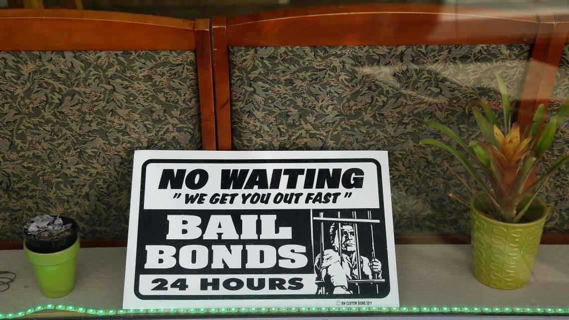 A sign in a bail bonds office across from the Hall of Justice in San Francisco. The cash bail bond system discriminates against poor people who lack homes to put up as security for getting out of jail.