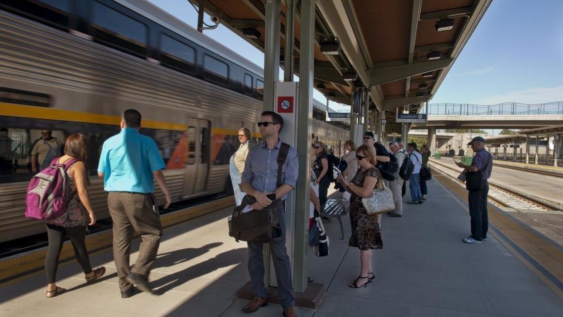 Passengers wait for the train to Roseville from the Capitol Corridor on Tuesday afternoon, July 8, 2014. The Capitol Corridor rail officials intend to build a new track between Roseville and downtown Sacramento, allowing them to increase passenger train service from one round-trip a day to as many as ten.