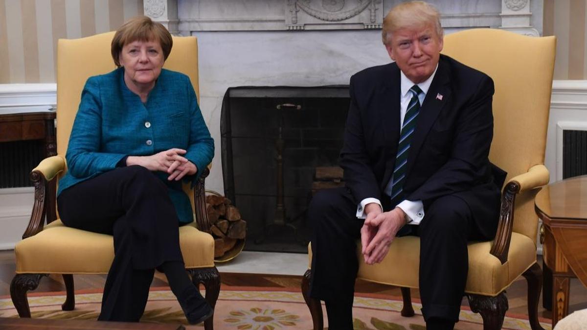 German Chancellor Angela Merkel (L) meets with U.S. President Donald Trump in the Oval Office in March. She has since concluded that Germany can’t depend on him.