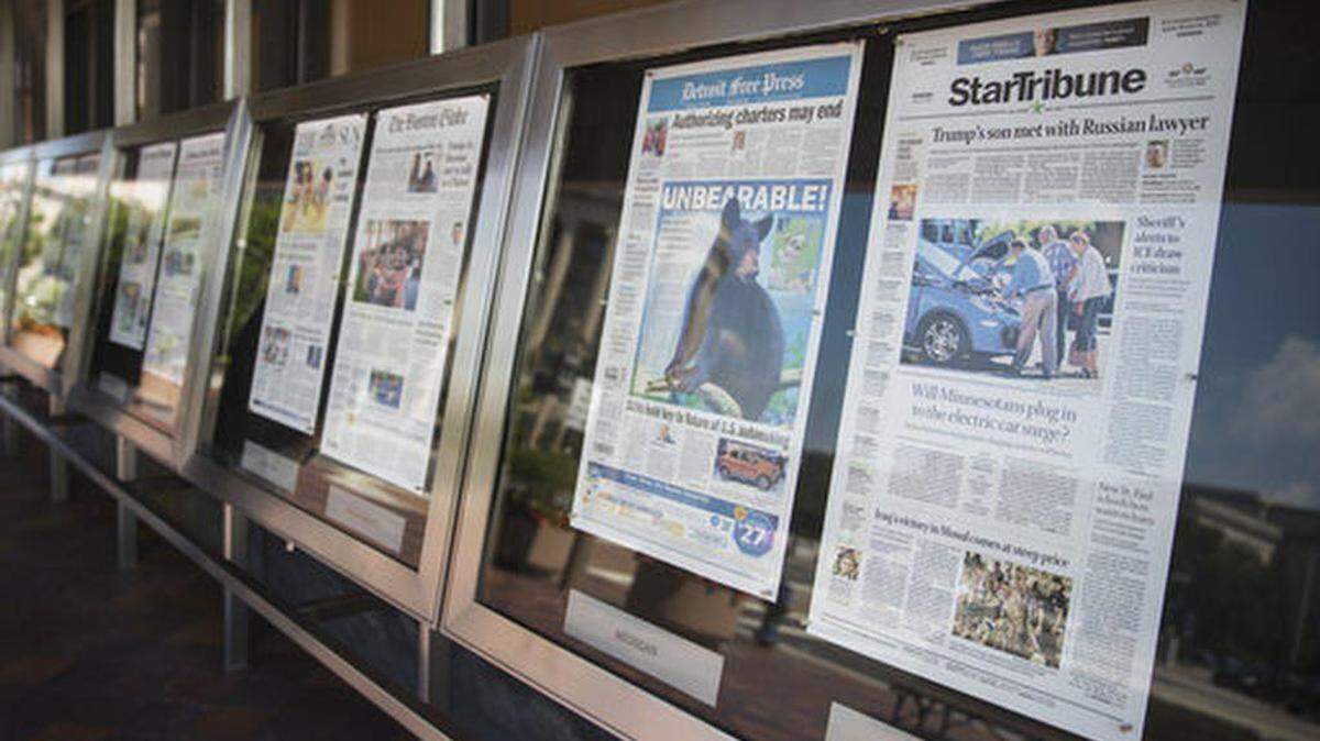 Newspaper front pages are displayed at the Newseum in Washington, Monday, July 10, 2017. News outlets are seeking permission from Congress for the right to negotiate jointly with Google and Facebook, two companies that dominate online advertising and online news traffic.