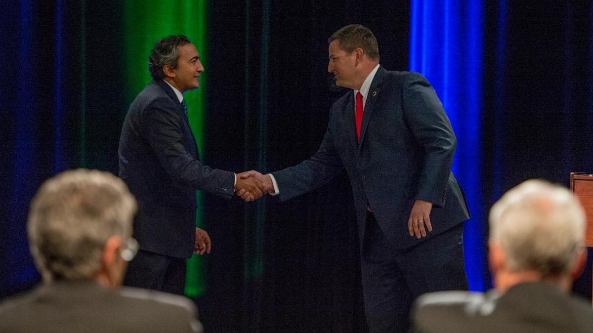 Democratic Rep. Ami Bera, left, shakes hands on Tuesday, Oct. 18, 2016, with his Republican challenger, Sacramento County Sheriff Scott Jones, following the debate for the highly competitive 7th Congressional District. They met in a debate held at KVIE television studios in Sacramento, Calif.