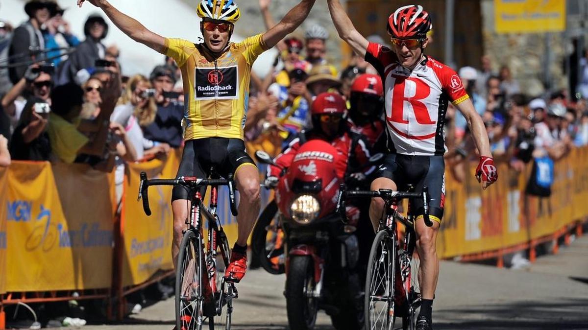 Chris Horner, left, and teammate Levi Leipheimer cross the finish line together during Stage 7 of the 2011 Tour of California cycling race in San Bernardino. Later, Leipheimer called out Horner for his diet of junk food.