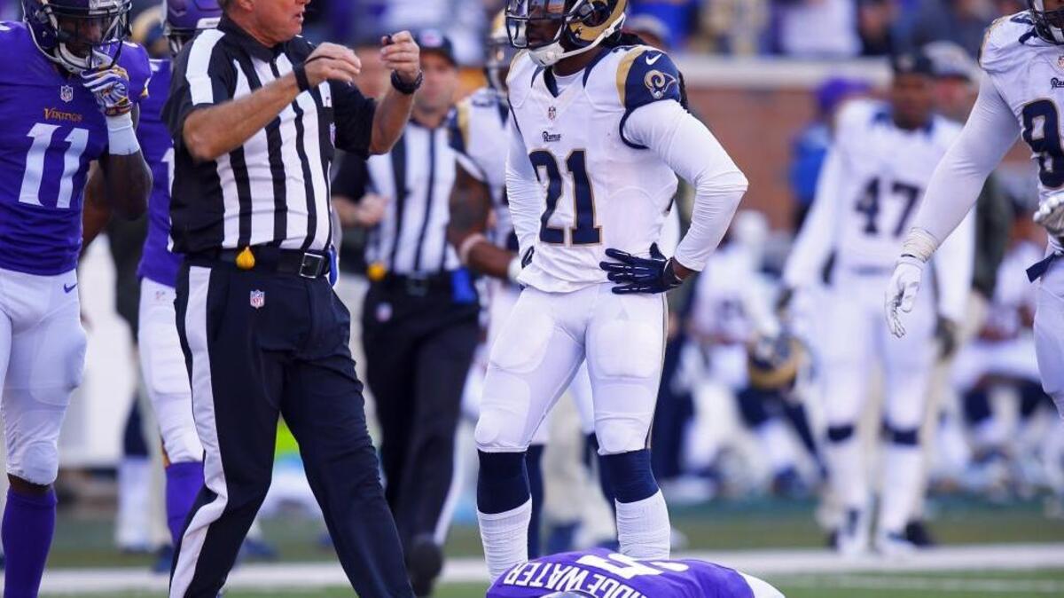 Minnesota Vikings quarterback Teddy Bridgewater lies on the field after a tackle to his head by St. Louis Rams cornerback Lamarcus Joyner during an NFL game last year. Bridgewater left the game with a concussion after this hit.