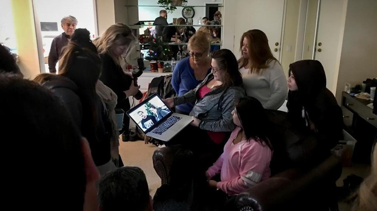 Aida Sandoval looks at a video produced by Sacramento Bee multimedia photojournalist Manny Crisostomo that documented the day the Sandoval family and friends endured as doctors at Stanford Lucile Packard Children’s Hospital worked for more than 17 hours to successfully separate conjoined twins Eva and Erika Sandoval on Dec. 6 and 7, 2016.