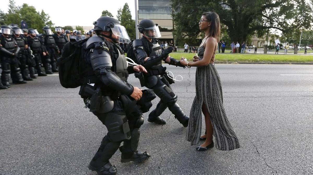 Ieshia Evans is detained by law enforcement as she protests the shooting death of Alton Sterling near the headquarters of the Baton Rouge Police Department in Louisiana on July 9.