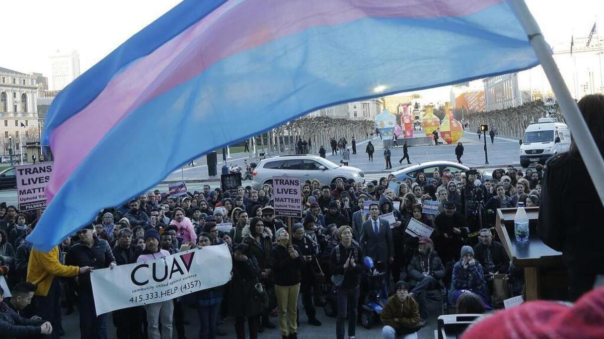 A crowds listens to speakers during a Feb. 23 rally at City Hall in San Francisco against President Donald Trump’s decision to roll back a federal rule saying public schools had to allow transgender students to use the bathrooms and locker rooms of their chosen gender identity.
