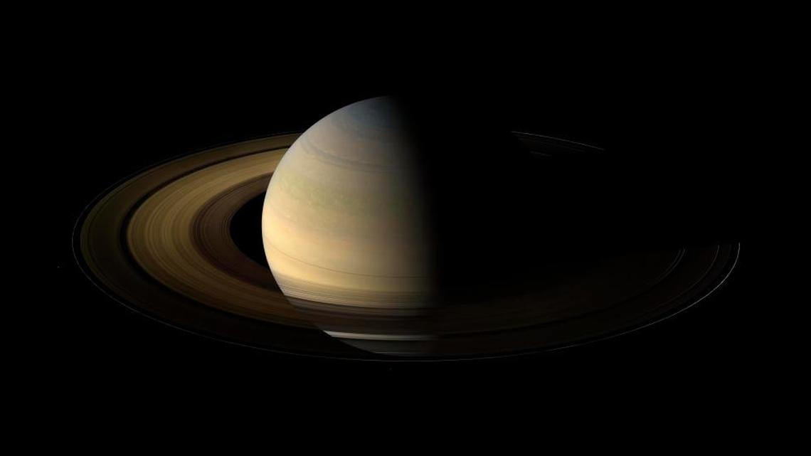 This Aug. 12, 2009 composite image made available by NASA shows Saturn in equinox seen by the approaching Cassini spacecraft.