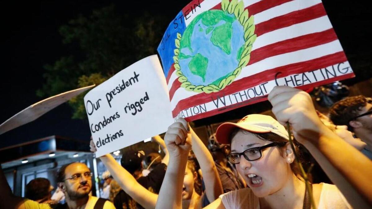 Demonstrators chant during protest at Franklin Delano Roosevelt park in Philadelphia on Thursday, during the final day of the Democratic National Convention.