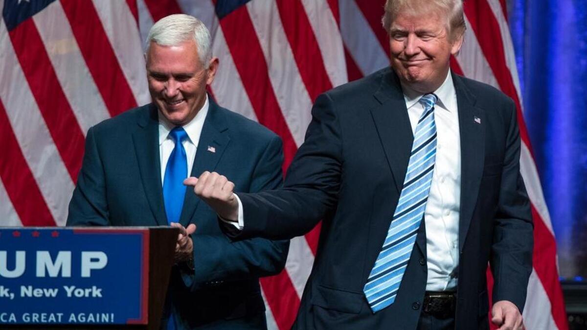 Republican presidential candidate Donald Trump introduces Indiana Gov. Mike Pence as his vice presidential running mate on Saturday.