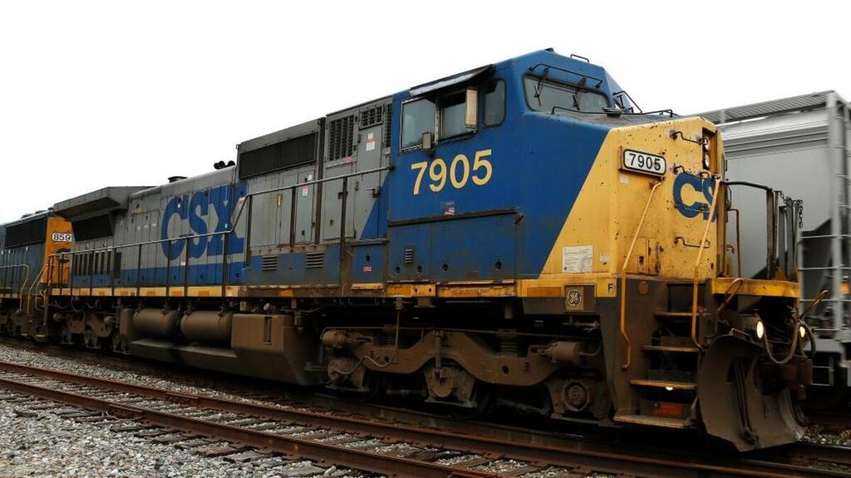 CSX freight trains pass in downtown Pittsburgh Thursday, March 2, 2017.