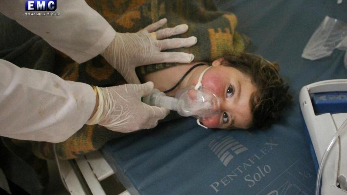 An April 4 photo by the Syrian anti-government activist group Edlib Media Center, authenticated based on its contents and other AP reporting, shows a Syrian doctor treating a child at a makeshift hospital in the town of Khan Sheikhoun, northern Idlib province, Syria, following a chemical attack. The attack killed dozens and prompted a U.S. strike on a Syrian airfield.