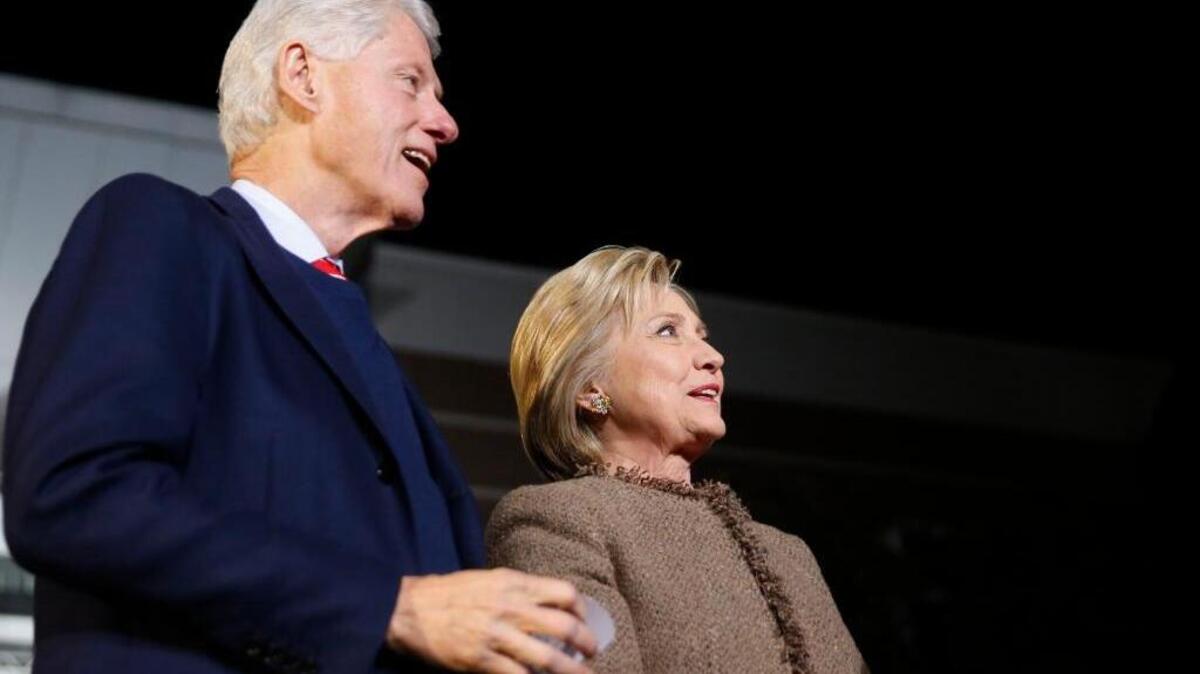 Democratic presidential candidate Hillary Clinton and her husband, former President Bill Clinton, are introduced to speak at a “Get Out The Vote Rally” in Columbia, S.C., in February.