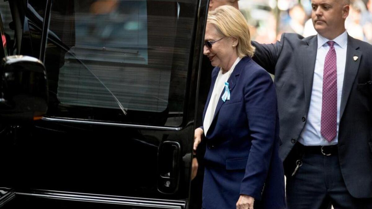 Democratic presidential candidate Hillary Clinton gets into a van as she departs an apartment building Sept. 11, 2016, in New York. Clinton’s campaign said the Democratic presidential nominee left the 9/11 anniversary ceremony in New York early after feeling “overheated.” Her campaign later acknowledged that she had been diagnosed with pneumonia.