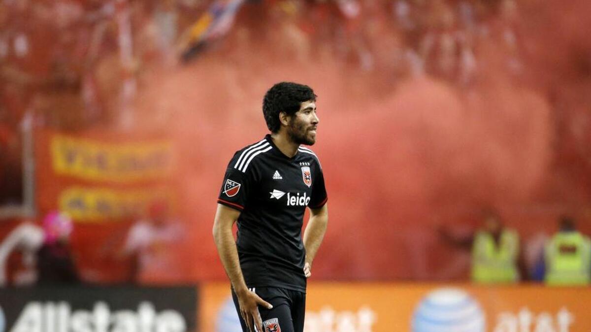 D.C. United midfielder Miguel Aguilar walks off the field after his team lost 1-0 to the New York Red Bulls in November 2015.