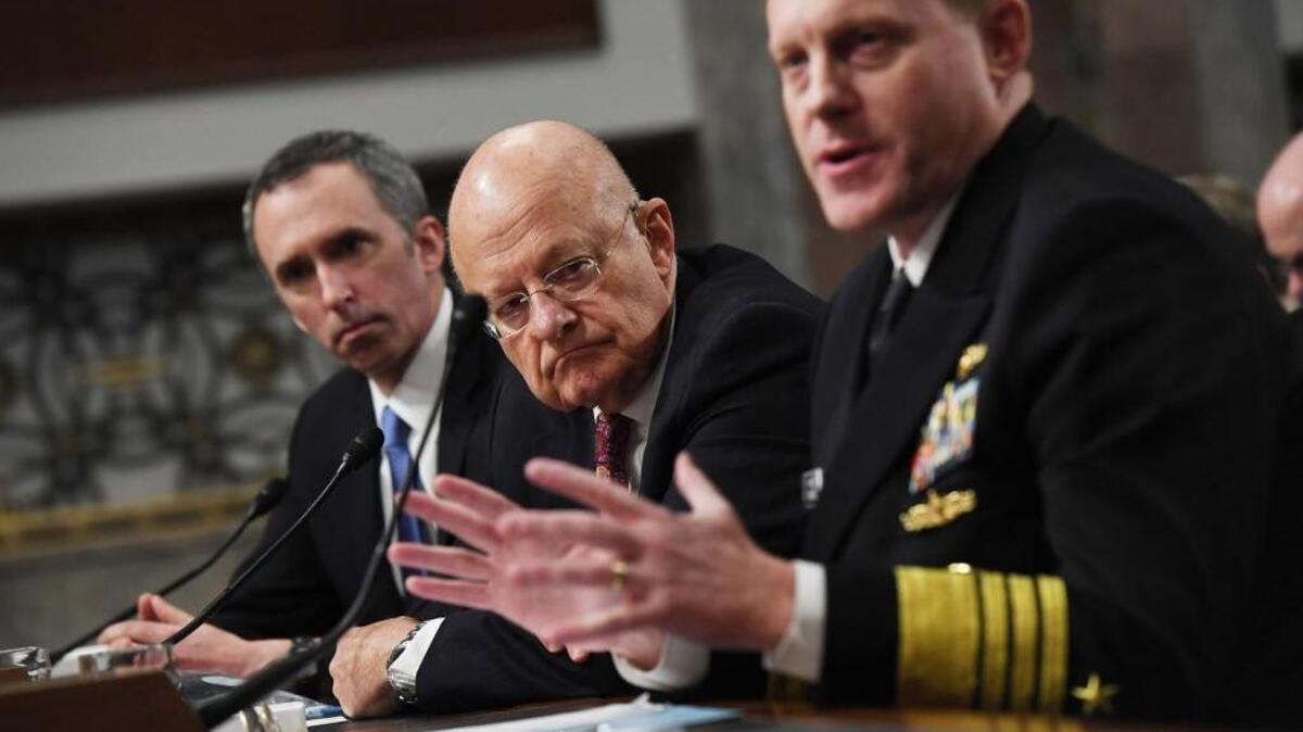 Secretary of Defense for Intelligence Marcel Lettre, left, U.S. Director of National Intelligence James Clapper, center, and Director of United States National Security Agency Michael Rogers testify Thursday before the Senate Armed Services Committee that Russia meddled in the 2016 presidential election.
