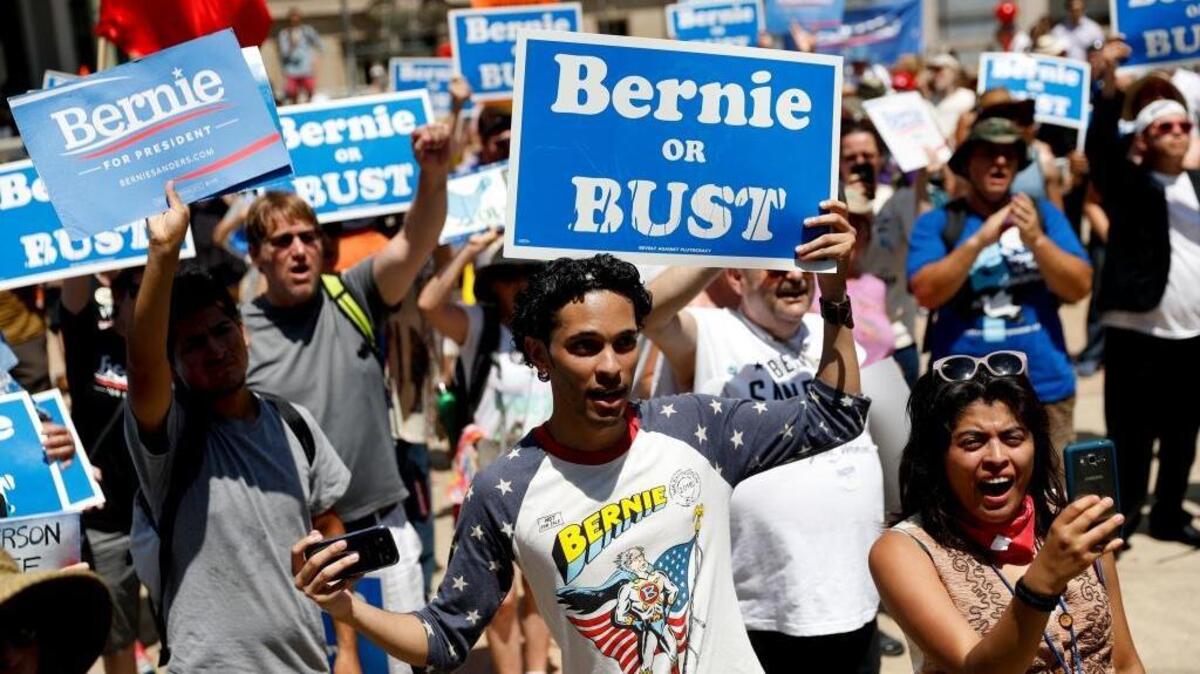 Supporters of Sen. Bernie Sanders, I-Vt., rally near City Hall in Philadelphia on Tuesday, the second day of the Democratic National Convention.