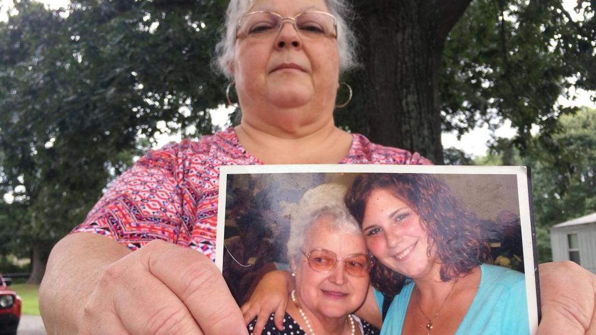 Susan Bro, the mother of Heather Heyer, holds a photo of Bro's mother and her daughter in Charlottesville. Heyer was killed Saturday, Aug. 12, 2017. Bro said that she is going to bare her soul to fight for the cause that her daughter died for.
