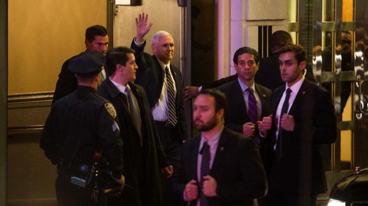 Vice President-elect Mike Pence leaves the Richard Rodgers Theatre after a performance of “Hamilton” in New York on Friday.