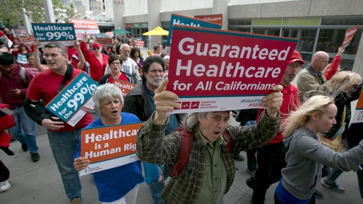 Supporters of single-payer health care march to the Capitol. A bill, SB 562, by state Sen. Ricardo Lara and Sen. Toni Atkins would remake the health care system of California.