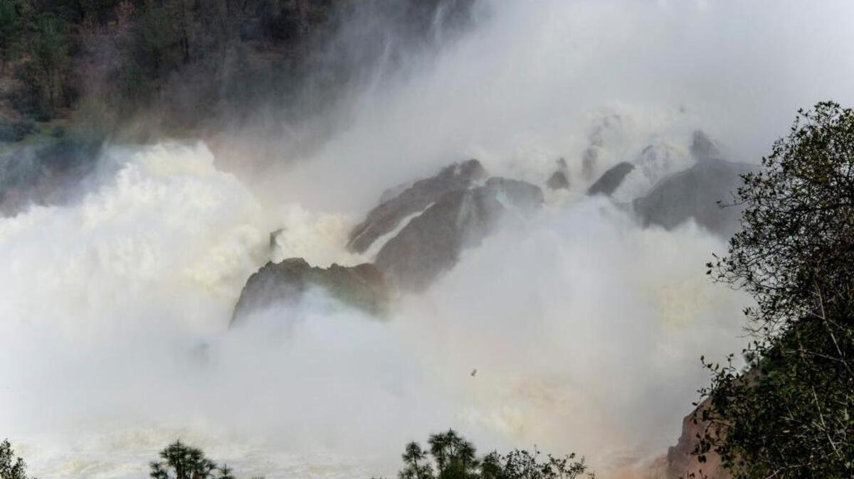 Water is released from the Oroville Dam on Monday.