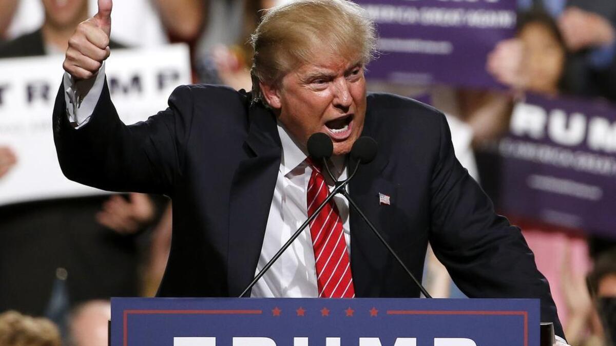 
Republican presidential candidate Donald Trump finishes speaking before a crowd of 3,500 last month in Phoenix.
