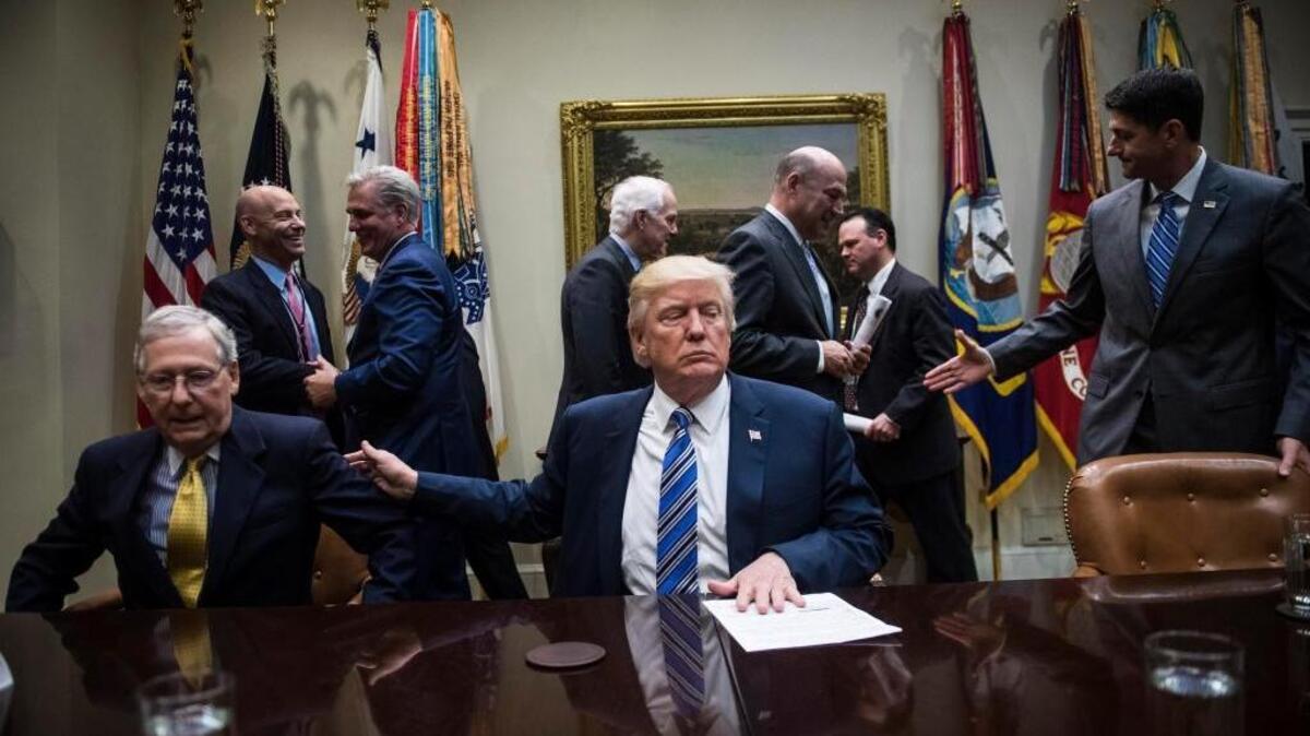President Donald Trump and Senate Majority Leader Mitch McConnell, R-Ky., left, at a meeting in the Roosevelt Room of the White House on June 6.