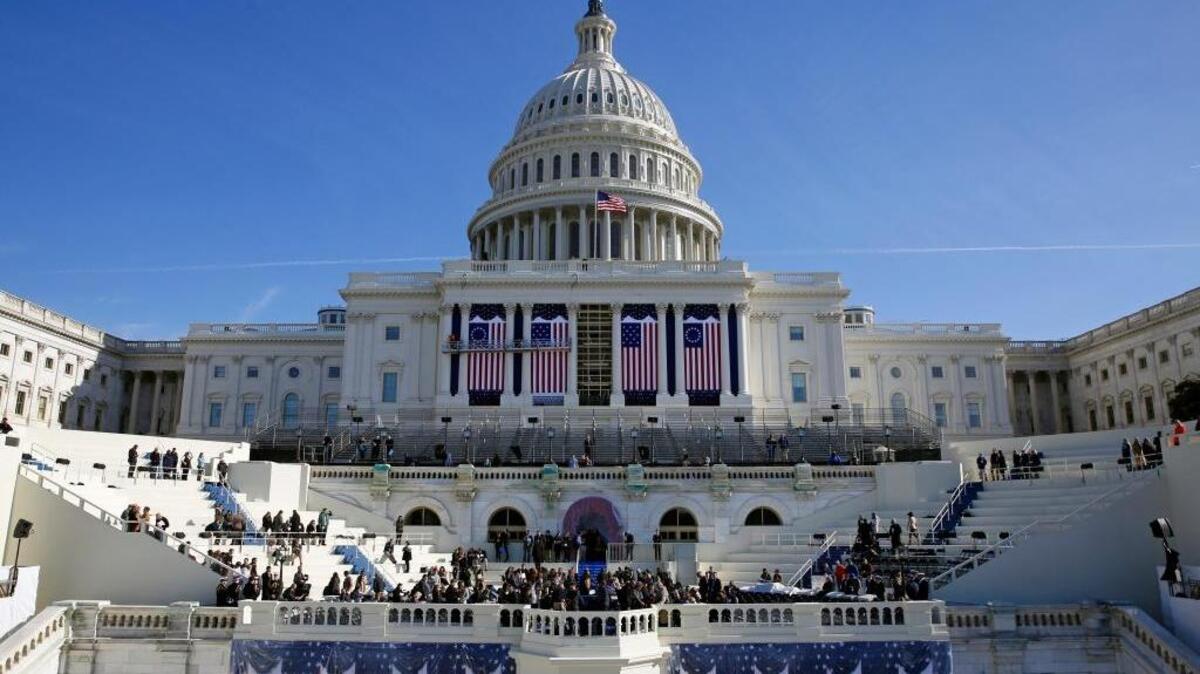 The U.S. Capitol frames the backdrop over the stage during a rehearsal of President-elect Donald Trump’s swearing-in ceremony in Washington. Some two dozen House Democrats plan to boycott Trump’s inauguration.