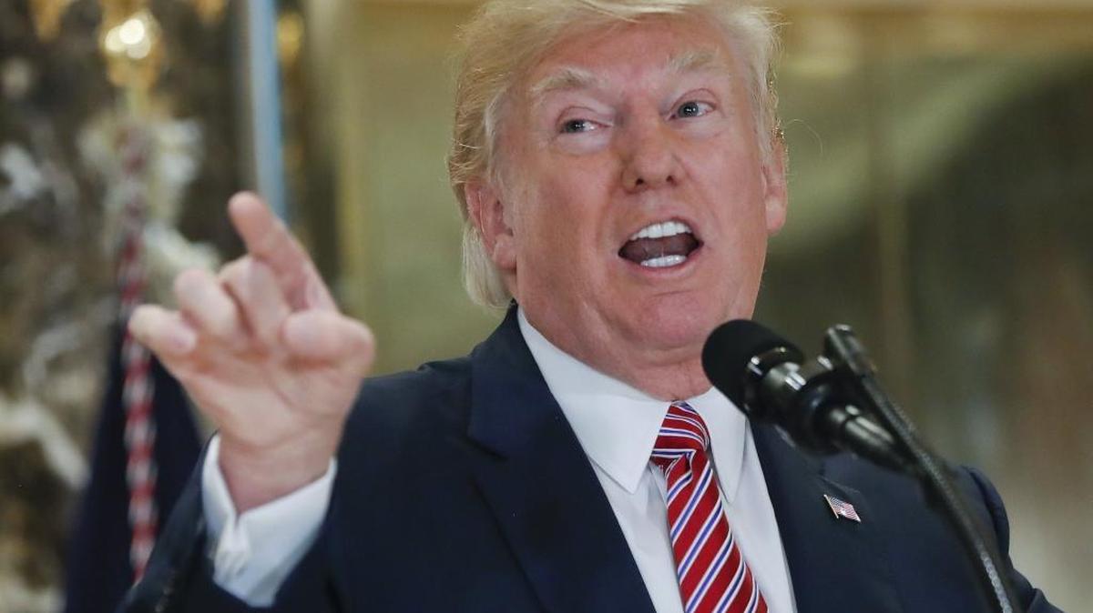 President Donald Trump speaks to the media in the lobby of Trump Tower on Aug. 15, 2017.