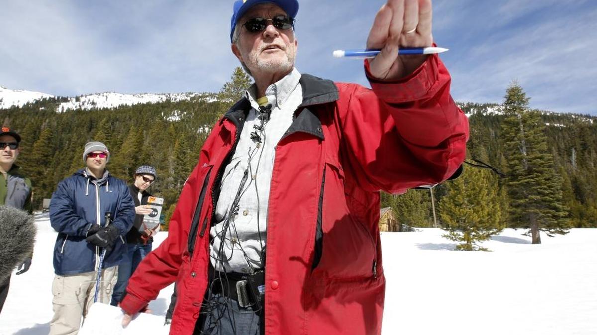 Frank Gehrke, chief of the California Cooperative Snow Surveys Program for the Department of Water Resources, talks to reporters after conducting the third manual snow survey of the season at Phillips Station near Echo Summit.