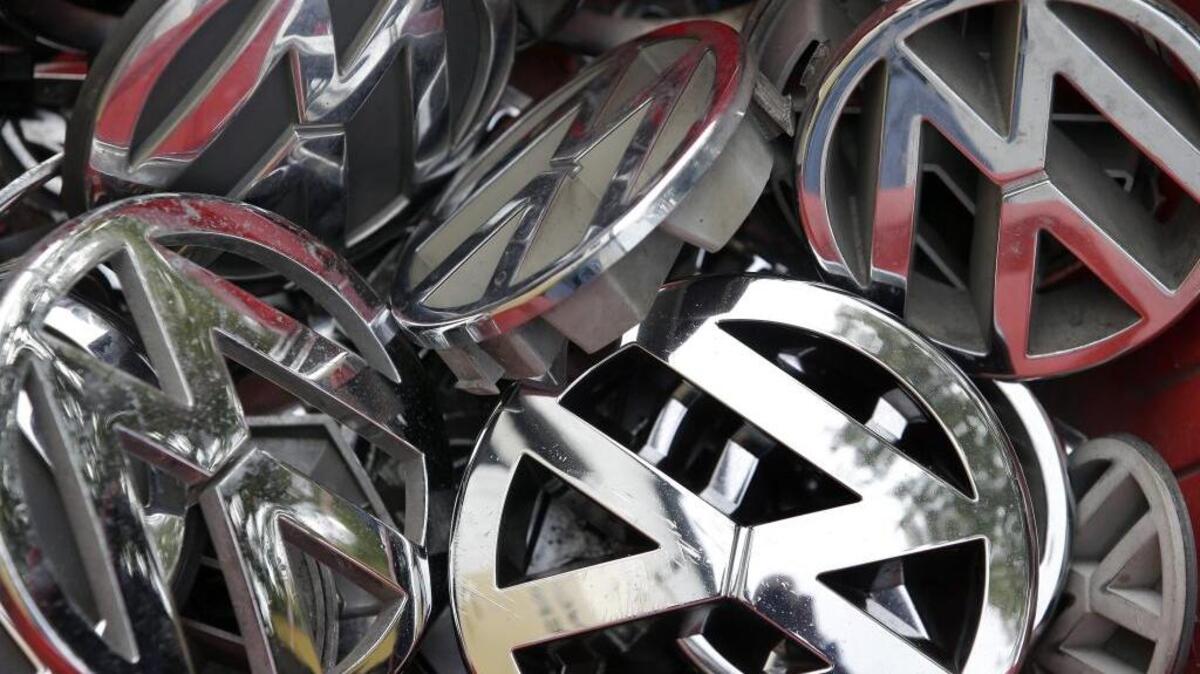 
Volkswagen ornaments sit in a box in a scrap yard in Berlin.
