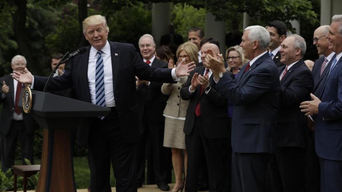 President Donald Trump speaks in the Rose Garden of the White House in Washington on Thursday after the House pushed through a health care bill.