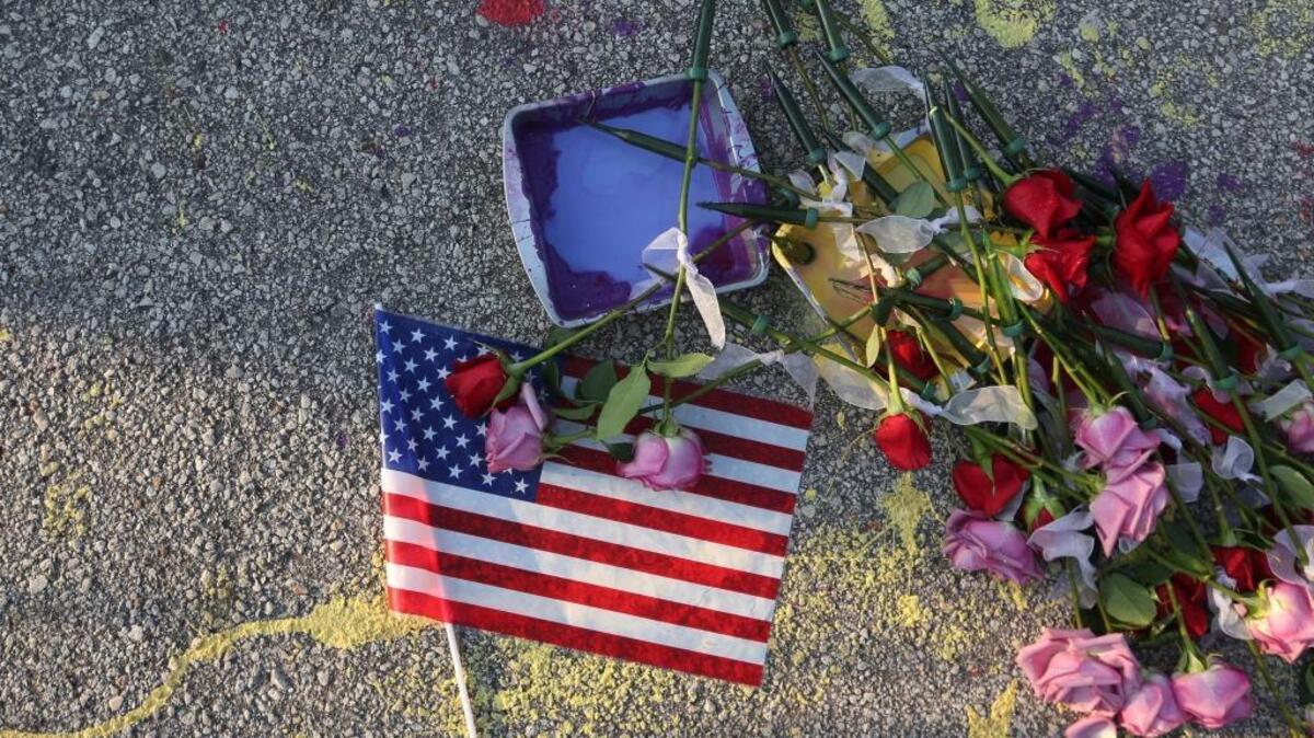 A makeshift memorial was created Monday in response to the mass shooting at the Pulse nightclub in Orlando, Fla.