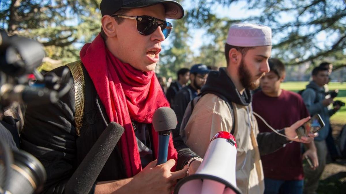 UC Davis College Republicans and other supporters march with Milo Yiannopoulos on Saturday.
