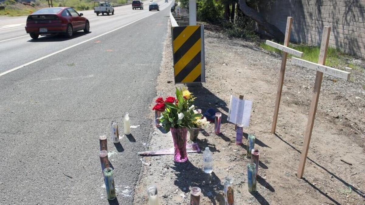 A memorial along southbound Highway 49 near Locksley Lane honors Placer High School students Jared Gaches, 15, of Auburn, and Trevor Keller, 15, of Foresthill. The two boys were struck and killed by a driver believed to be under the influence of drugs.