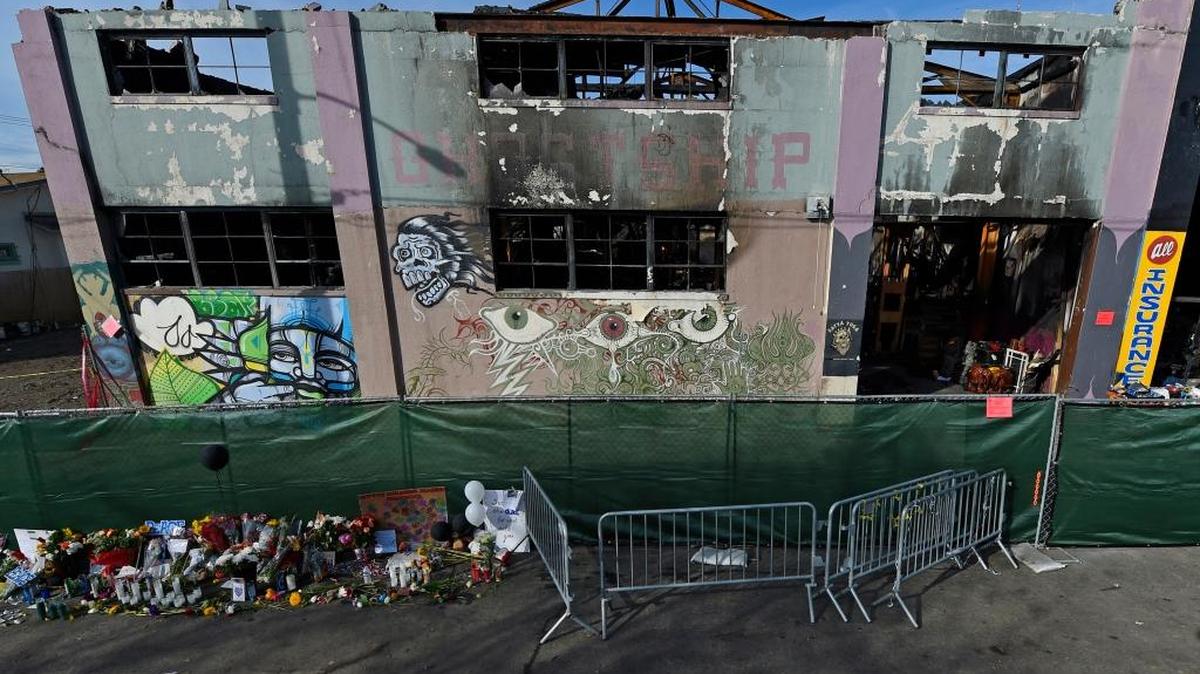 View of the outside of the scorched Ghost Ship warehouse building in Oakland on Dec. 12, 2016. A Dec. 2 fire tore through the two-story building on the 1300 block of 31st Avenue, killing 36 people.