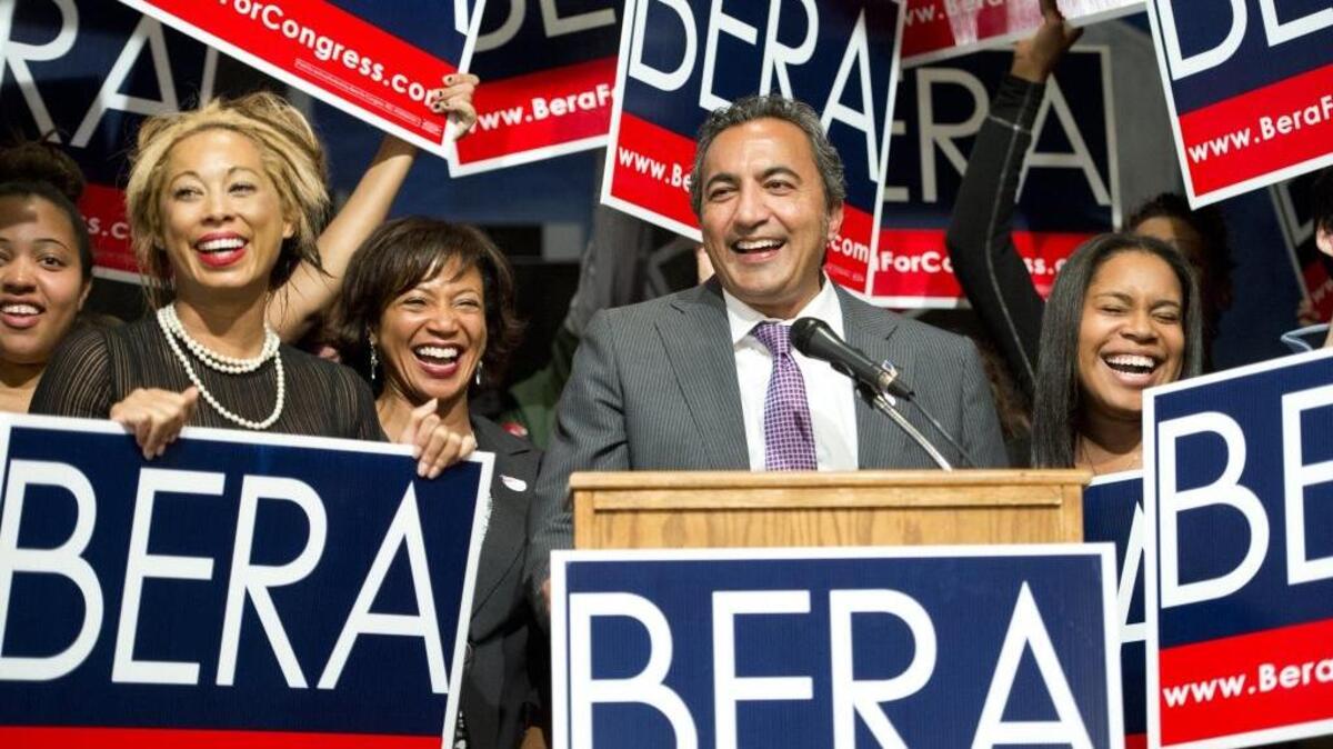 Rep. Ami Bera, D-Elk Grove, flanked by daughter Sydra Bera, right, and wife Janine Bera, left, celebrates his re-election in 2014.
