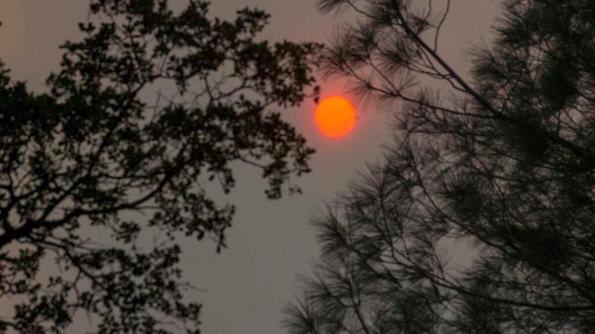 
Smoke nearly blocks the sun on the Wragg fire near Winters and Lake Berryessa.

