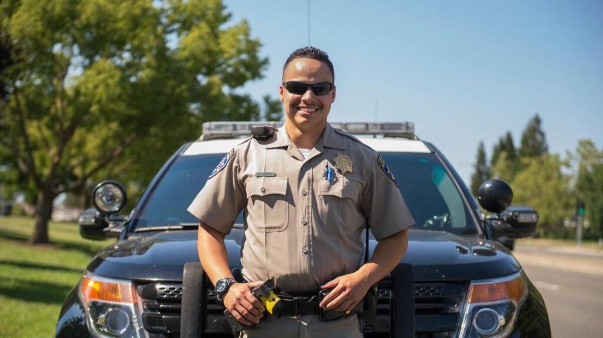 Edwin Lopez was homeless for seven months in 2012, now a highway patrol officer in Castro Valley, photographed on July 3, 2017, at North Laguna Creek Park in Sacramento.