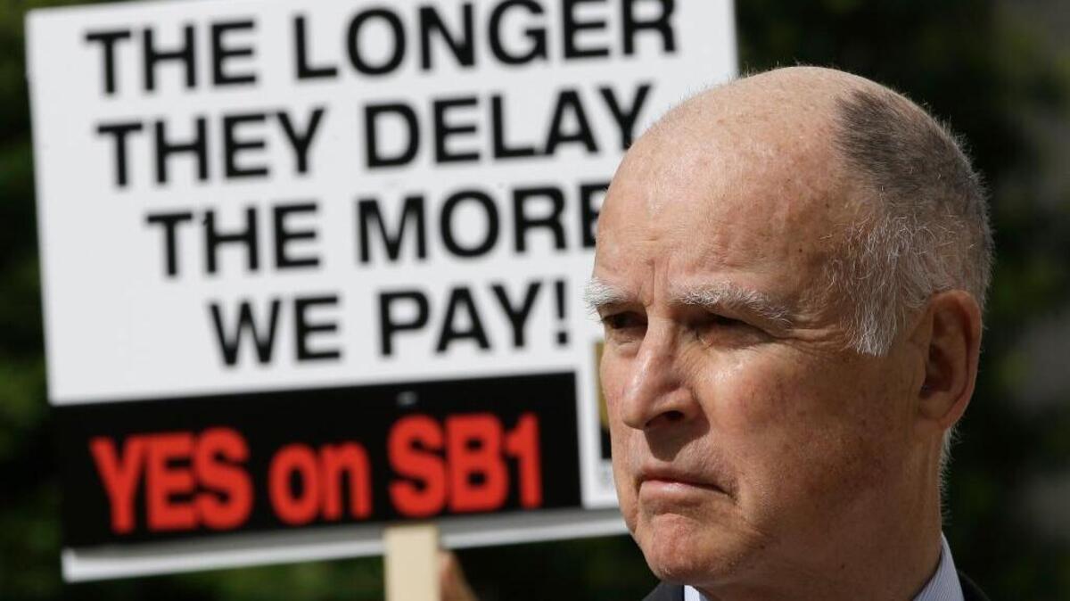 California Gov. Jerry Brown earlier this week at a rally to urge lawmakers to approve a plan for a $5 billion-a-year tax and fee road repair measure. The bill, SB1, supported by Brown and Democratic Legislative leaders, was passed late Thursday night.